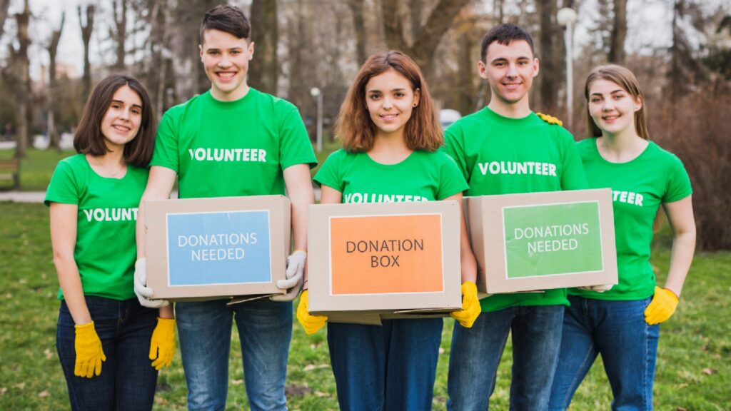 Environment Volunteer Concept With Persons Holding Boxes Donations 1024x576